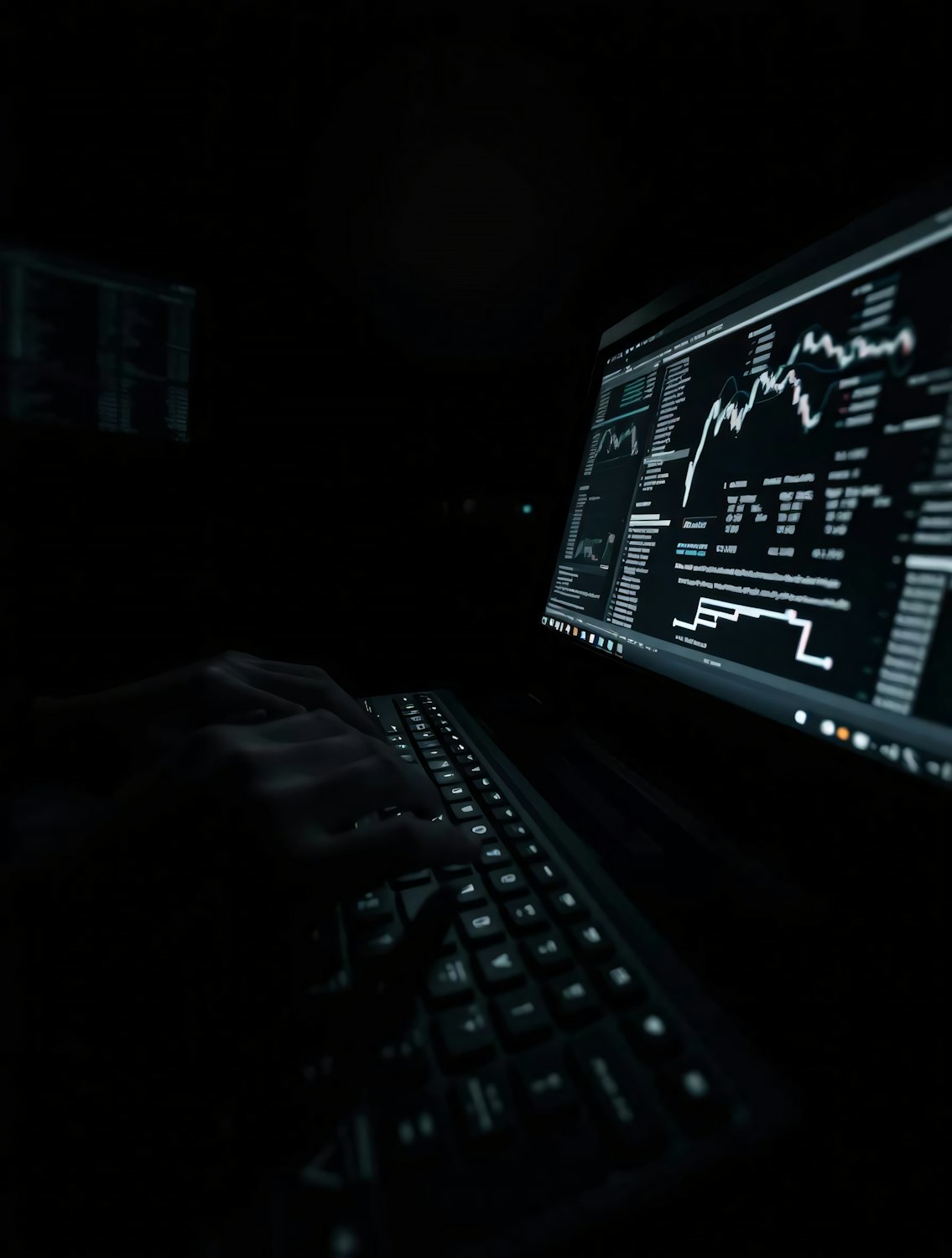 A person focused on a computer screen, carefully reading and analyzing job postings, demonstrating the process of identifying key terms and transferable skills.