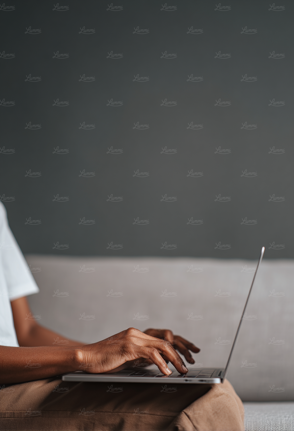 A professional uses a laptop at home, searching for remote sales opportunities on official government portals.